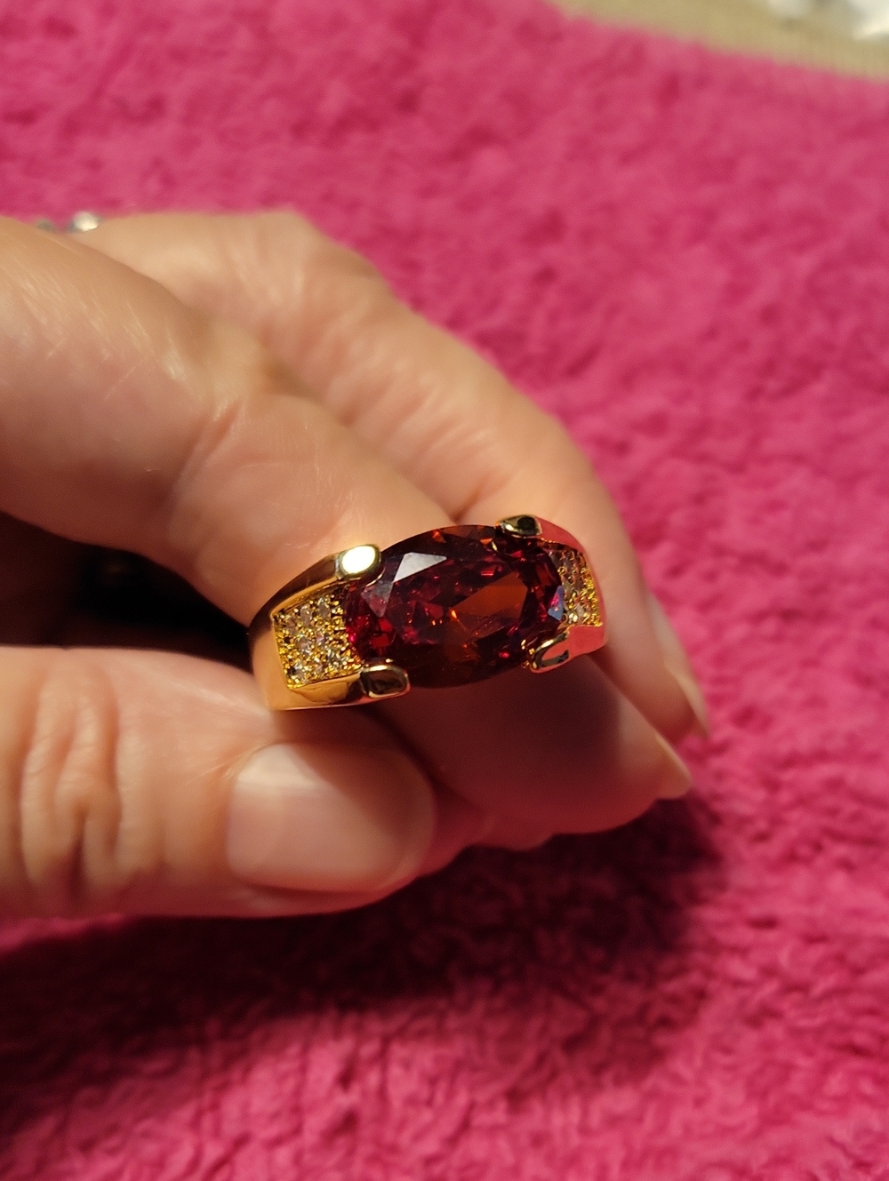 Stunning Ring with Deep Red Oval Gemstone
